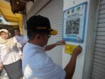 Tunggakan Retribusi Kios Capai Rp961 Juta, Pemkab Mojokerto Pasang Stiker Penertiban